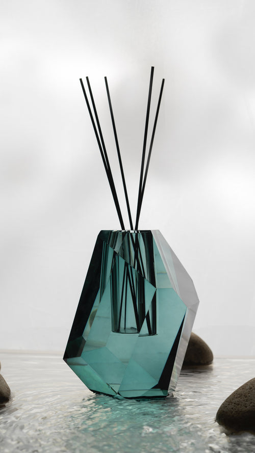 Lunare Gallery Azura hand-cut crystal reed diffuser luxury home fragrance in blue sculptural glass vessel for refined interiors.